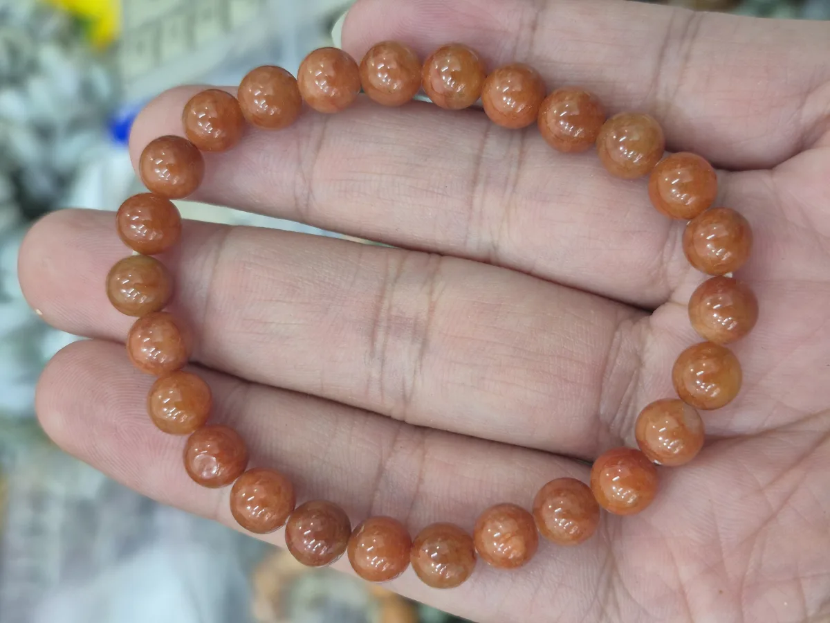 กำไลหยกน้ำผึ้ง ลูกปัด 7 มม. หยกพม่าธรรมชาติ สีส้มอมแดง — หยกพม่า จากแม่สอด