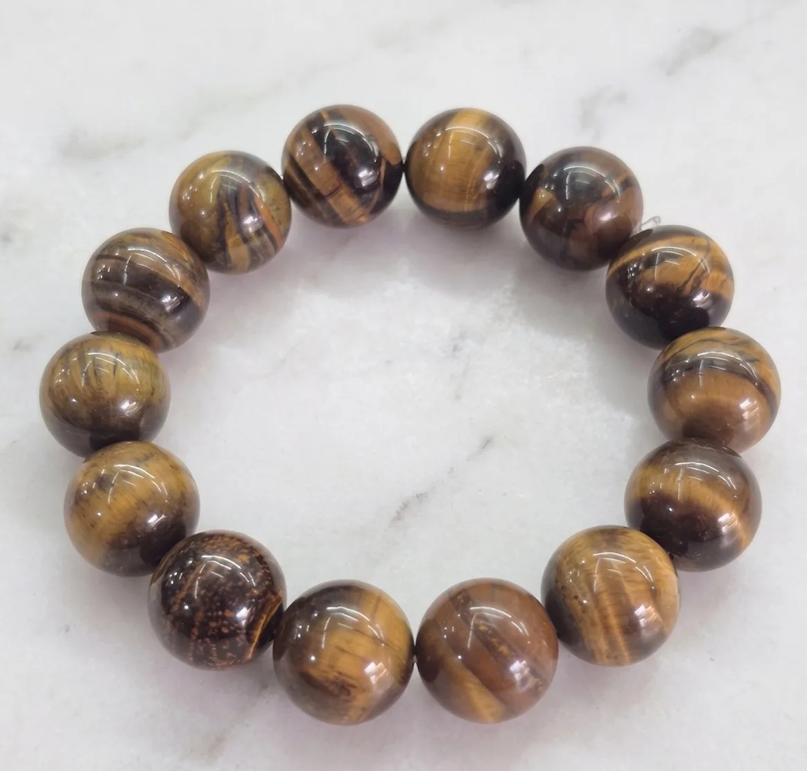 กำไลข้อมือหินตาเสือ (Tiger's Eye) สร้อยข้อมือหินมงคล เสริมบารมี ปกป้องคุ้มภัย — หินลูกปัด จากแม่สอด